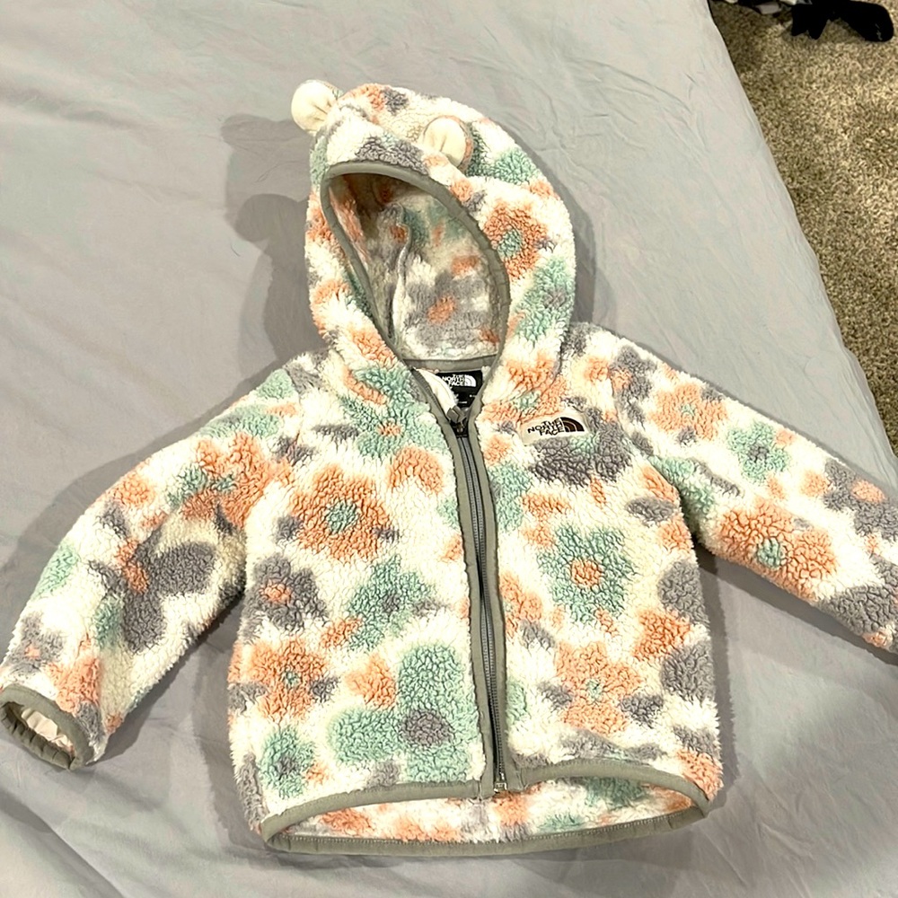 The North Face fleece zip up jacket.
